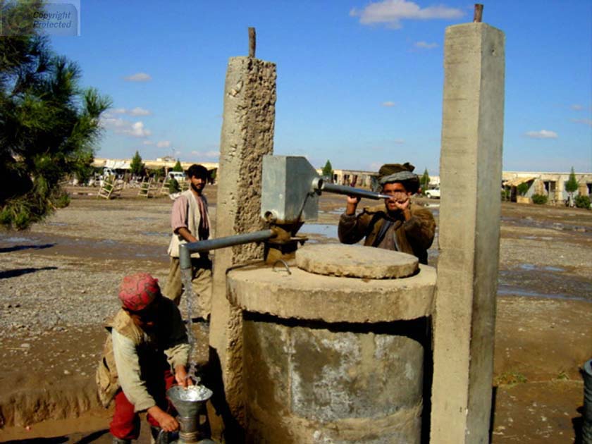 Father and Son at Well